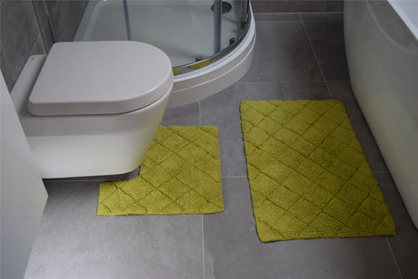 Durable and absorbent Kyra pedestal mat with woven diamond design, ideal for bathroom use