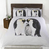 A charming photographic print on the Penguin Duvet Set showcasing an adorable family of penguins, highlighting their cute and friendly appearance for a cosy and inviting bedroom decoration