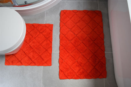 Kyra diamond-patterned bath mat designed for comfort, durability, and water absorption after showers