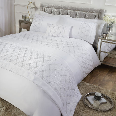 Monaco Filled Cushion showcasing geometric embroidery and extravagant sequin trims