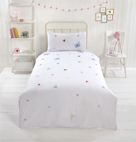 Back view of the duvet set displaying the plant-inspired slogan and eco-conscious materials used