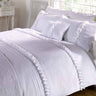 Intricately ruffled Serenity Duvet Set with vintage-inspired design and cotton seersucker banding