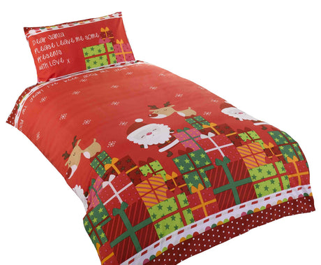 Matching pillowcase with Santa and reindeer design on a red background, included with the Dear Santa Duvet Set for festive bedtime comfort
