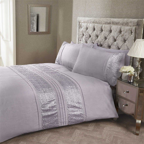 Close-up of Aurora Duvet Set showcasing intricate floral embroidery and button closure