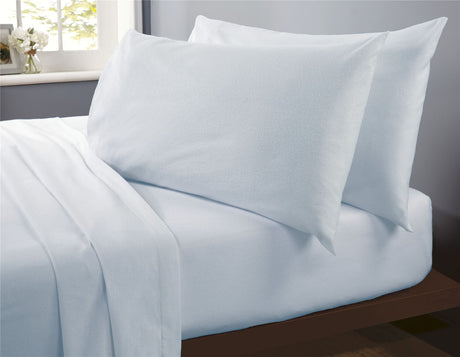 Complete brushed cotton sheet set in deep navy blue, showcasing its durability, softness, and rich colour for cosy bedding