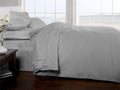 Close-up of the soft, breathable pure cotton percale fabric of the fitted sheet for comfortable sleep