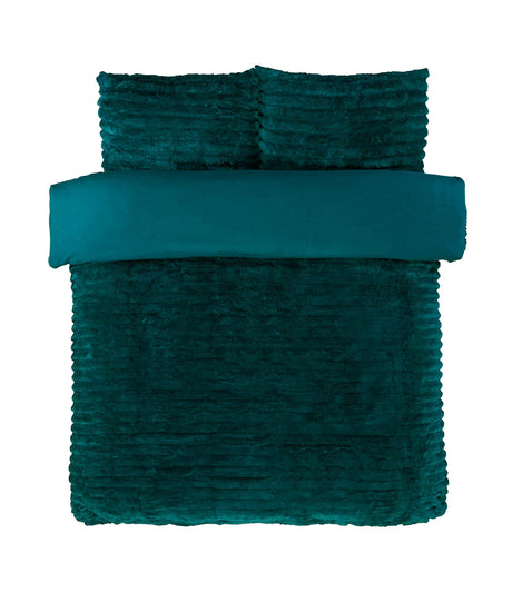 View of the entire duvet set including matching pillowcases, showcasing coordinated design and luxurious texture
