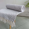 Eco-friendly Eden Cotton Throw showcasing modern geometric design on soft recycled cotton fabric