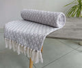 Eco-friendly Eden Cotton Throw showcasing modern geometric design on soft recycled cotton fabric