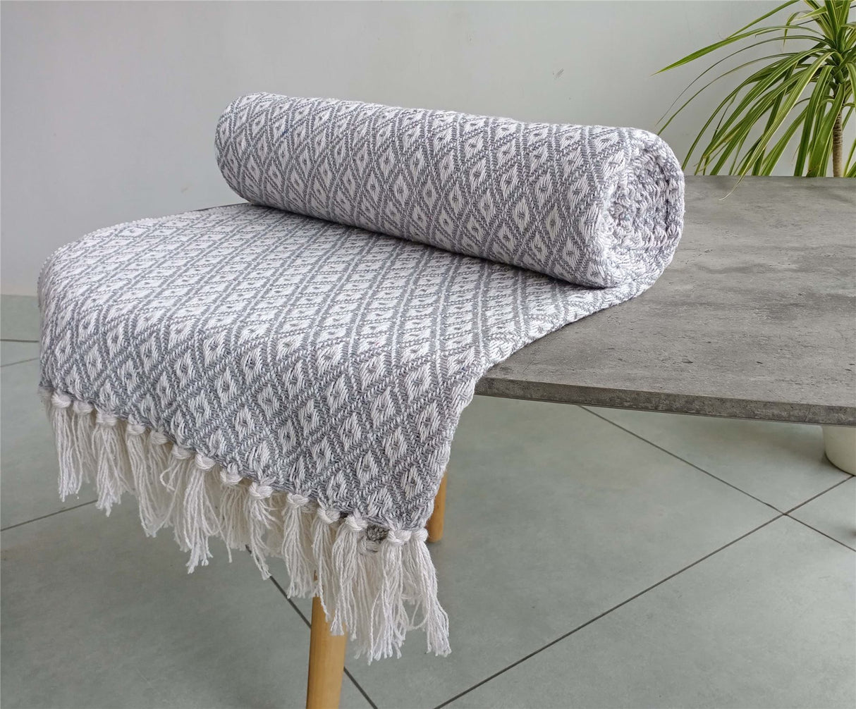 Eco-friendly Eden Cotton Throw showcasing modern geometric design on soft recycled cotton fabric
