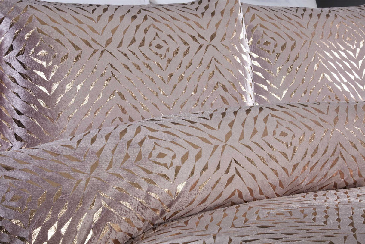 An image of the Bellagio Boudoir Cushion in Blush pink with gold foil detailing, measuring 30x50cm
