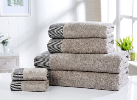 Two face cloths, each 30x30cm, crafted from super soft 100% cotton with textured border accents