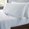 Soft white Happy Home Budget Sheet Set featuring 180 thread count microfibre fabric and non-iron, ideal for a cosy night's sleep