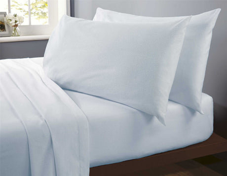 Soft white Happy Home Budget Sheet Set featuring 180 thread count microfibre fabric and non-iron, ideal for a cosy night's sleep