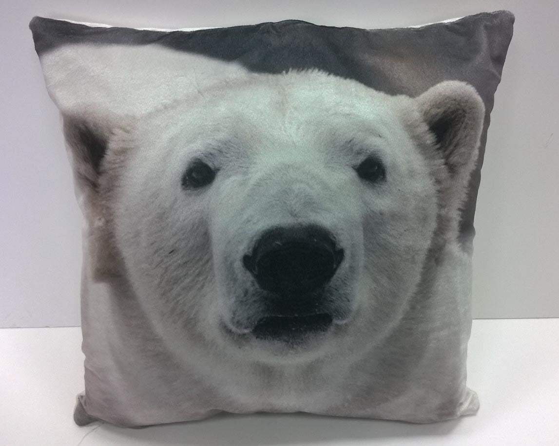 A 43x43cm multi-coloured filled cushion featuring a cute and friendly winter polar bear printed onto luxuriously soft velvet
