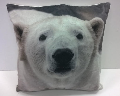 A 43x43cm multi-coloured filled cushion featuring a cute and friendly winter polar bear printed onto luxuriously soft velvet