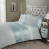 Full view of Aurora Duvet Set with matching pillowcases and detailed embroidery design
