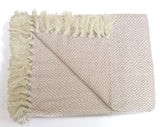 Luxurious Rona Throw with cream and natural toned stripes and geometric pattern