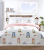 Brightly coloured Padstow Duvet Set featuring beach huts and seagulls in a watercolour style, fully reversible with a seaside stripe pattern on white microfibre fabric