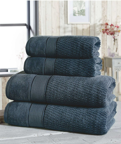 Royal velvet bath towel measuring 70x120cm with velvet feel texture and elegant border detail