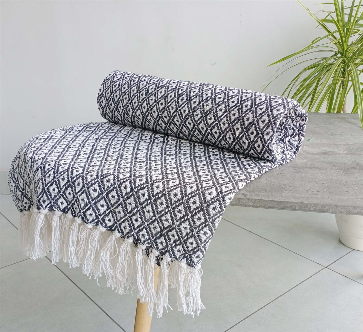 Elegant Eden Cotton Throw featuring a detailed geometric pattern and sustainable recycled cotton material