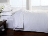 Full view of the luxury cotton pillowcase with a subtle sheen, perfect for a restful night's sleep