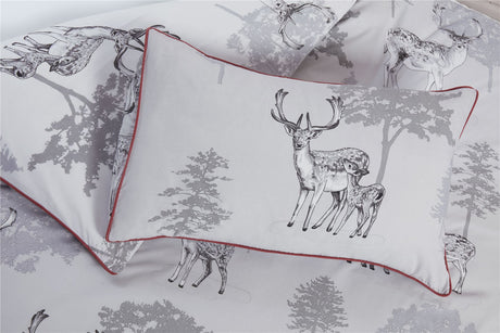 Fully reversible Sherwood Duvet Set with beautiful watercolour woodland motif and striking piping finish