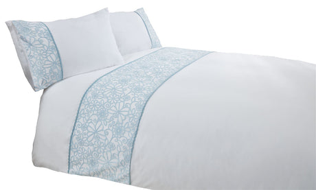 Matching pillowcases featuring floral and butterfly motifs with scalloped edges
