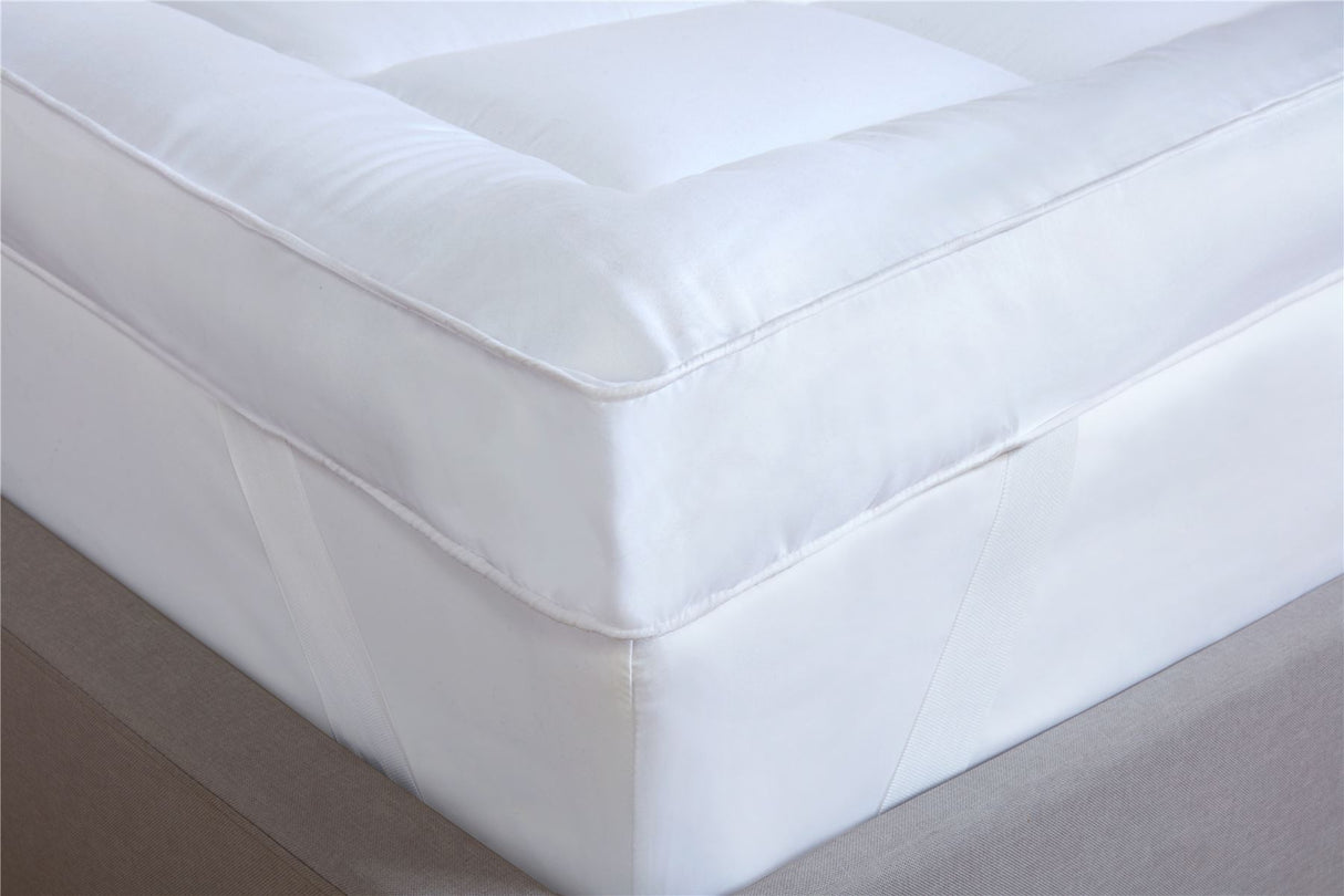 Elegant image showcasing a neatly made bed with a soft, high-quality luxury mattress topper to improve sleep experience