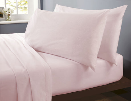 Luxurious brushed cotton sheet set in soft pastel blue with a smooth finish