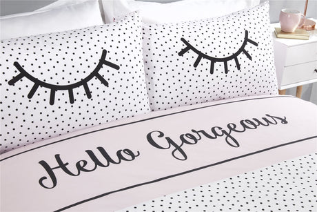 King-size duvet cover showcasing reversible design with eyelash and polka dot motifs, crafted from easycare fabric