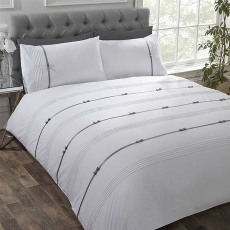 Contemporary Clarissa duvet set showcasing elegant pintuck stitching and charming ribbon bows