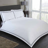 Contemporary Mayfair Duvet Set featuring minimalist design with embroidered rectangular border frame on duvet and pillowcases