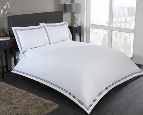 Contemporary Mayfair Duvet Set featuring minimalist design with embroidered rectangular border frame on duvet and pillowcases