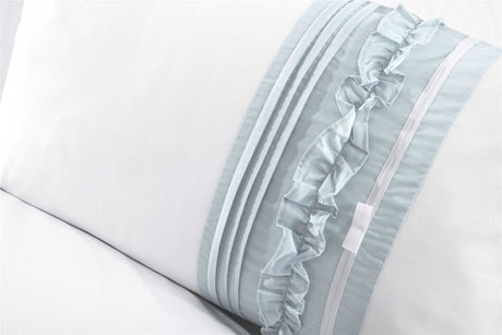 Tilly Duvet Set styled in a modern bedroom setting, illustrating its chic and understated embellishments