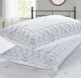Luxurious Gabrielle Duvet Set arranged to evoke timeless sophistication and cosy comfort