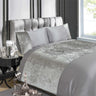 Close-up of the sumptuous velvet fabric showcasing its soft, inviting surface perfect for relaxing evenings