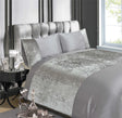 Close-up of the sumptuous velvet fabric showcasing its soft, inviting surface perfect for relaxing evenings