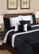 Elegant Monaco Filled Cushion featuring geometric embroidery and luxurious sequin trims