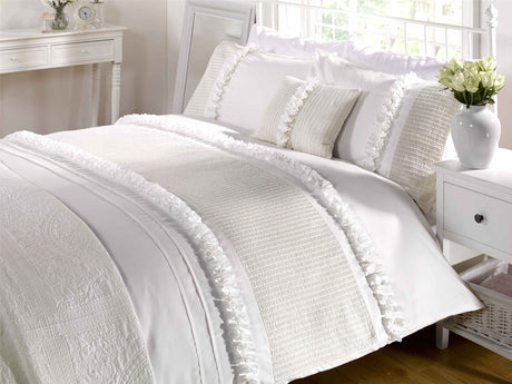 Close-up of the Serenity Duvet Set showcasing ruffled detailing and button closure
