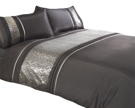 Elegant Ritz Duvet Set with detailed silver sequined design on head and matching pillowcases with button closure