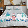 A whimsical Gonk Family duvet set featuring adorable gonks with oversized hats, gloves, and boots on a grey background with twinkling stars and icicles, made from soft microfibre fabric with a fully reversible design, perfect for winter-themed bedrooms