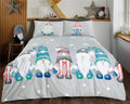 A whimsical Gonk Family duvet set featuring adorable gonks with oversized hats, gloves, and boots on a grey background with twinkling stars and icicles, made from soft microfibre fabric with a fully reversible design, perfect for winter-themed bedrooms