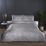 Bellagio Duvet Set featuring silver base with silver foil accents, perfect for stylish bedroom decor