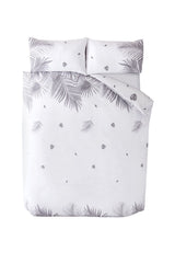 Single-sized duvet cover with tropical plant print, featuring a plastic-free packaging and popper closure