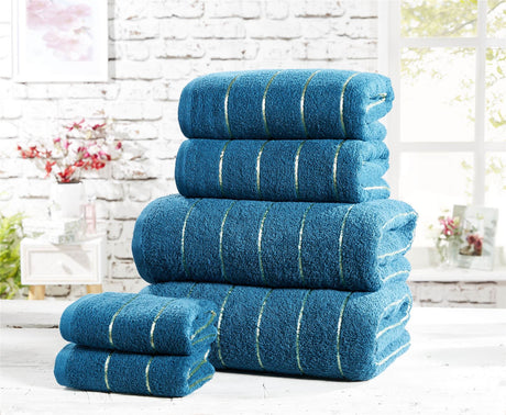 Close-up of a Sandringham bath towel highlighting the metallic accents and sophisticated stripe pattern