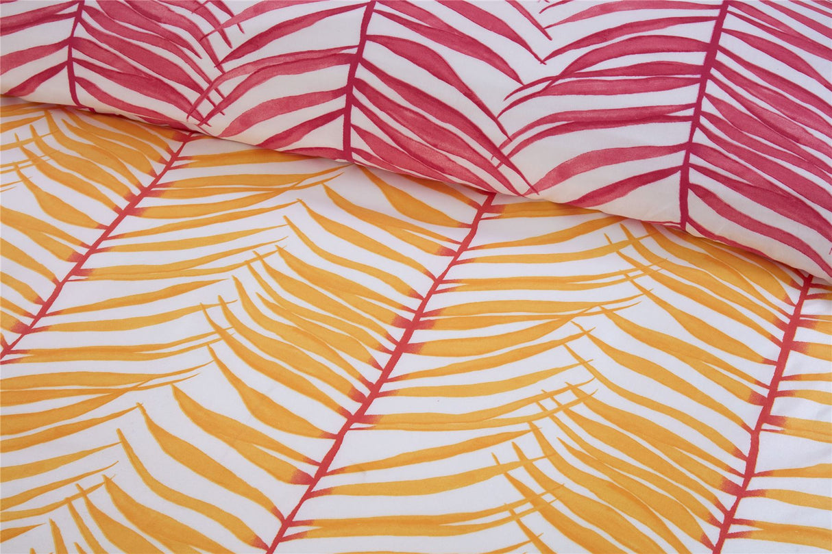 Bright and colourful tropical duvet set with striking palm leaf design in yellow and pink, ideal for a lively bedroom decor