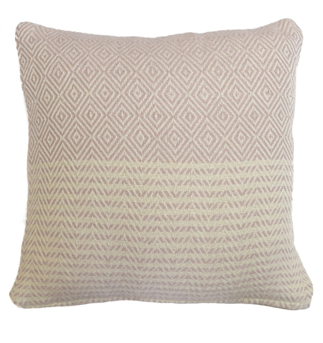 Soft-woven geometric cushion in muted palette for sofa or bed decor