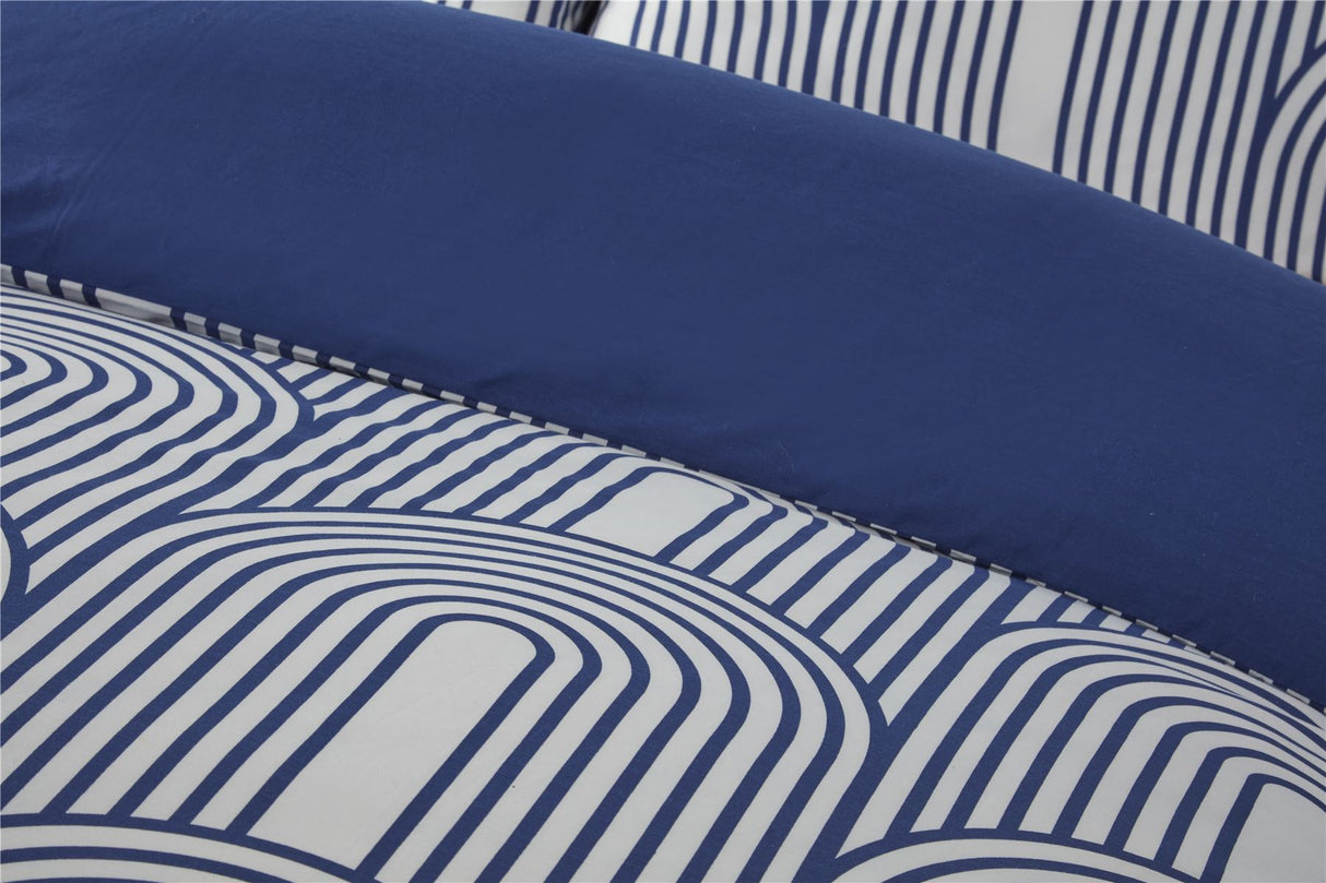 Bedroom styled with the Arches Duvet Set showcasing matching pillowcases and a stylish geometric pattern