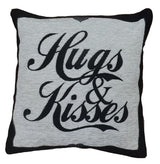 Hugs and kisses chenille cushion in cool text on sofa